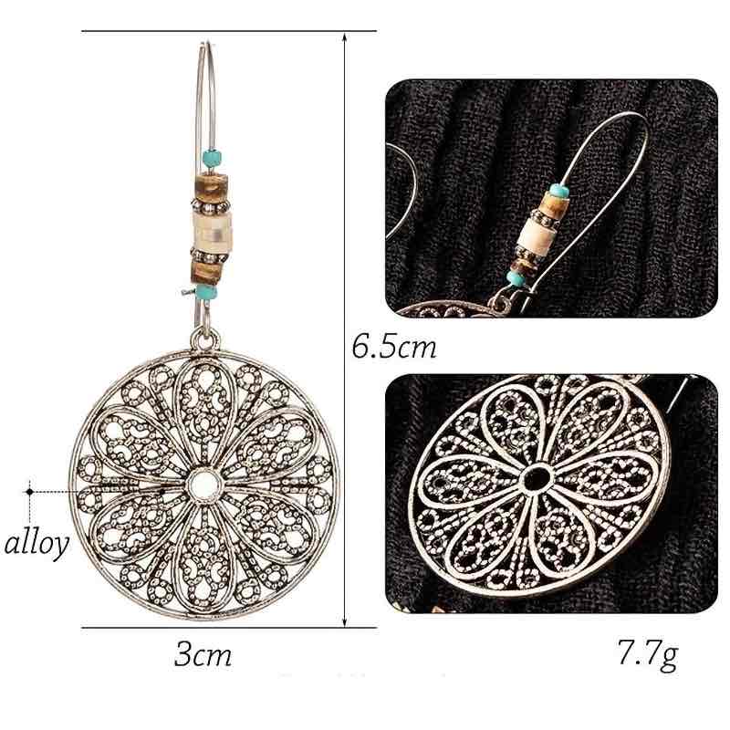 Detailed view of the oxidised boho dangle earrings showing dimensions (6.5cm length, 3cm width) and weight (7.7g), with close-ups of the alloy material and beadwork.